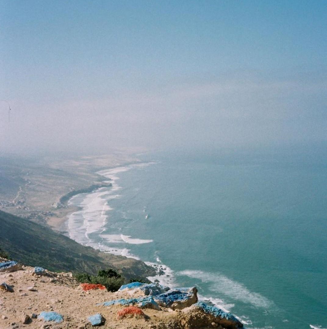 Wild Atlantic coastline near Agadir, cliffs meeting an empty beach