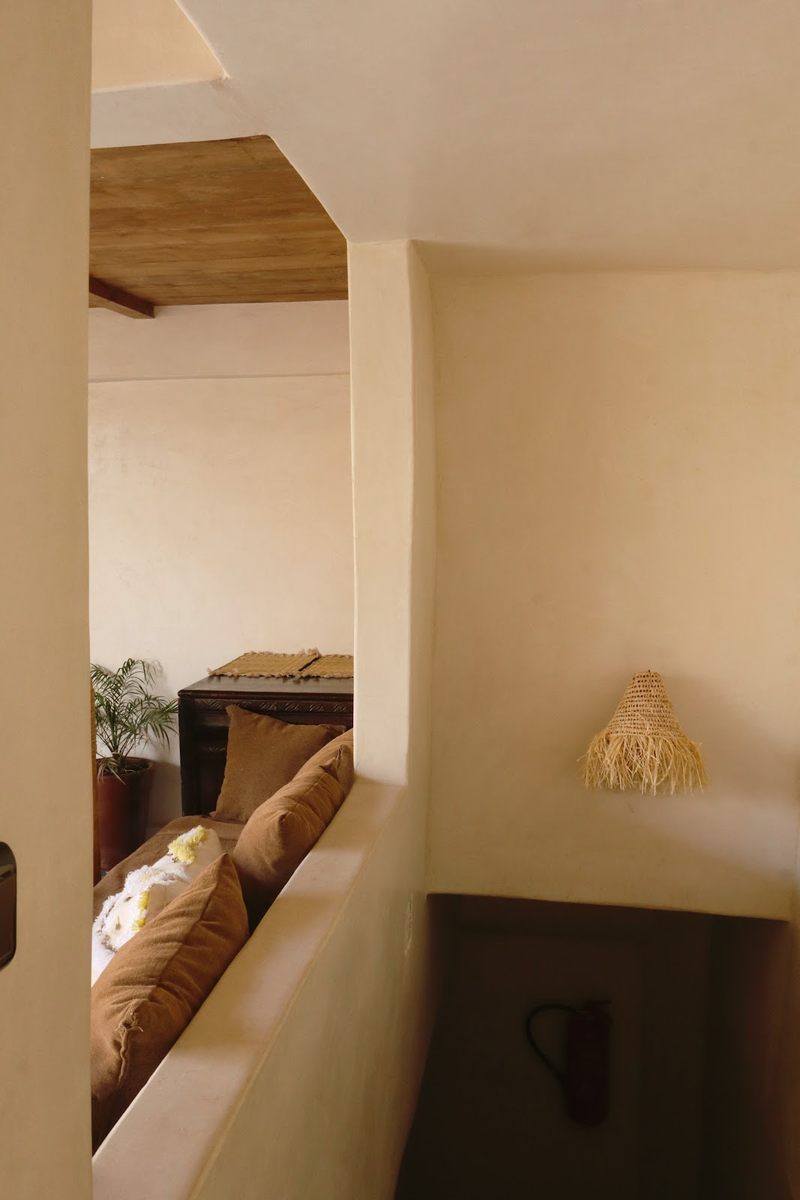 Interior stair nook with a warm wall lamp